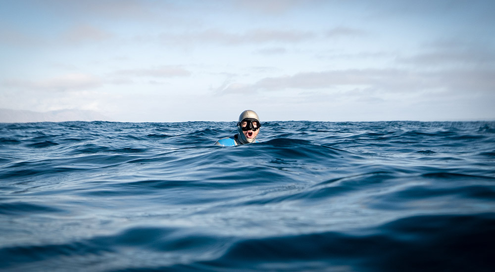 Swimming like dolphin: on surface to catch a few breaths.